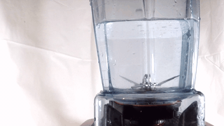 Cleaning the blender with soap and water