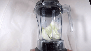 A gif video of large pieces of onion being chopped in the blender